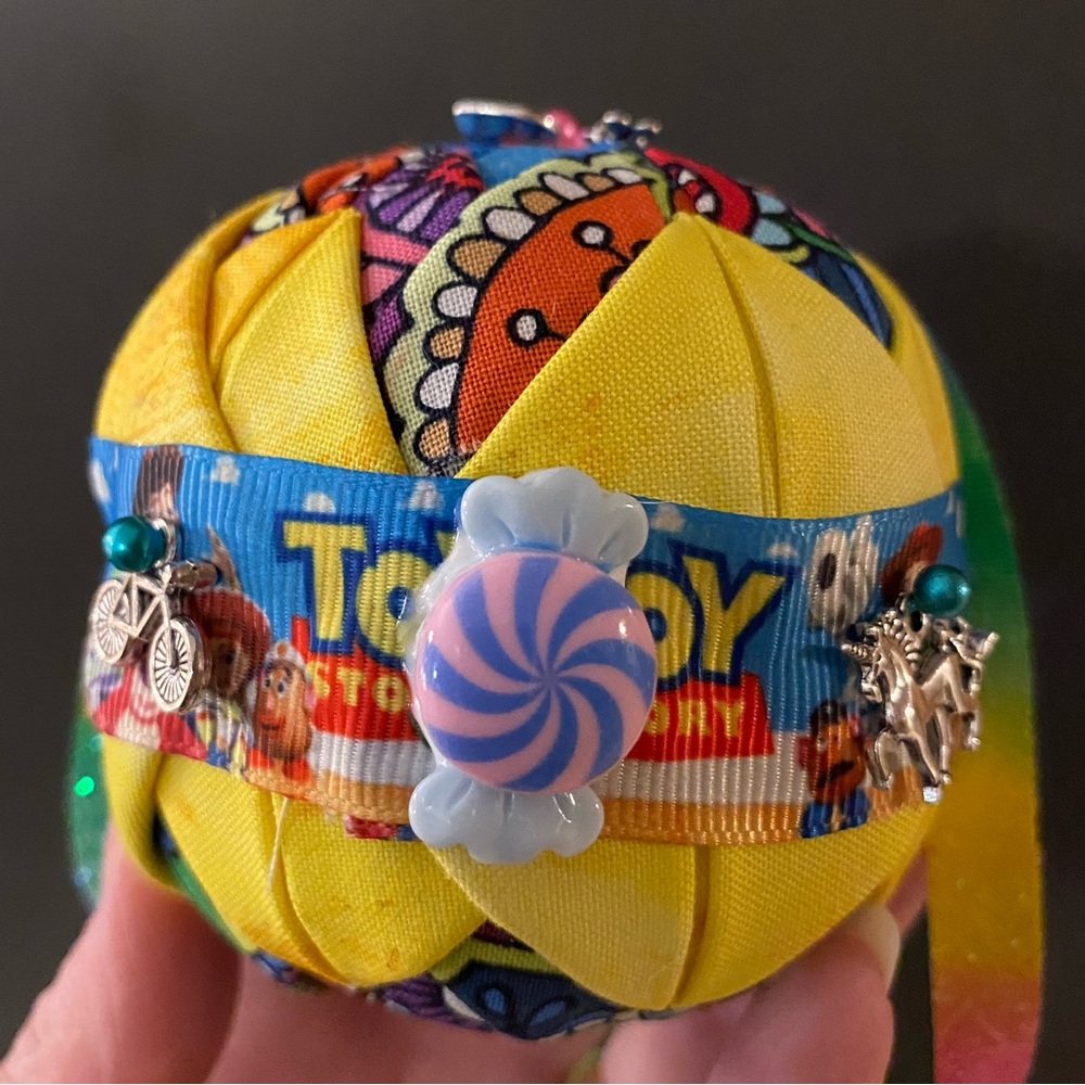 Colorful Toy Story inspired Themed Hand Quilted Ornament with charms